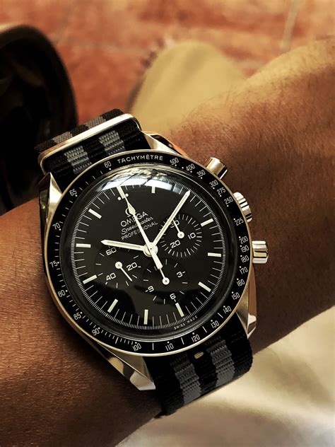 omega speedmaster grey strap.